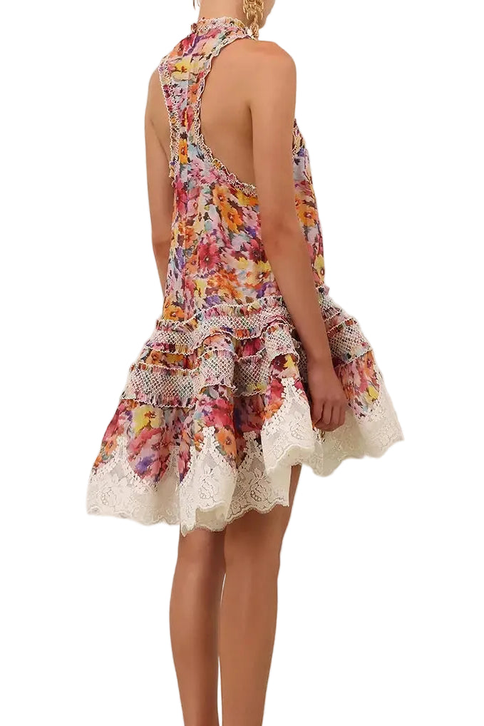 Zimmermann Luna Shirred Lantern Mini Dress featuring a colorful floral print and delicate lace trim on the hem.