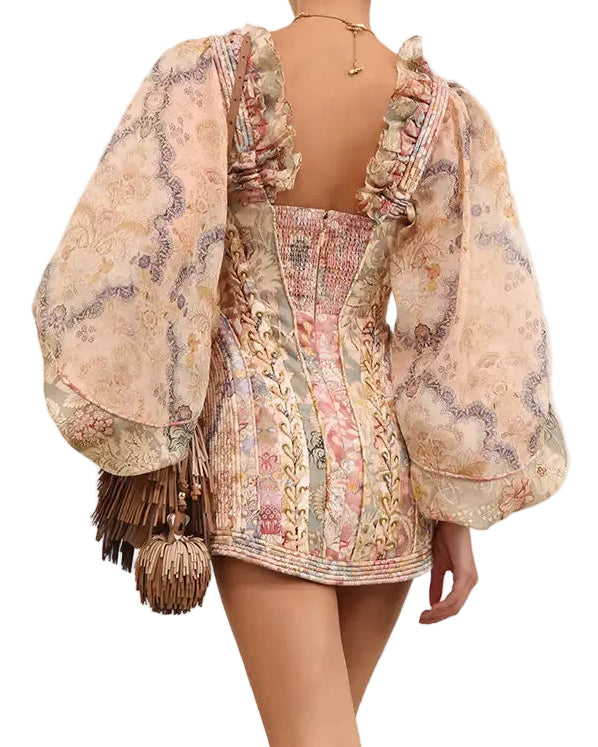 Zimmermann Rebellion Corded Mini Dress features billowy sleeves and a structured corset bodice with floral embroidery.